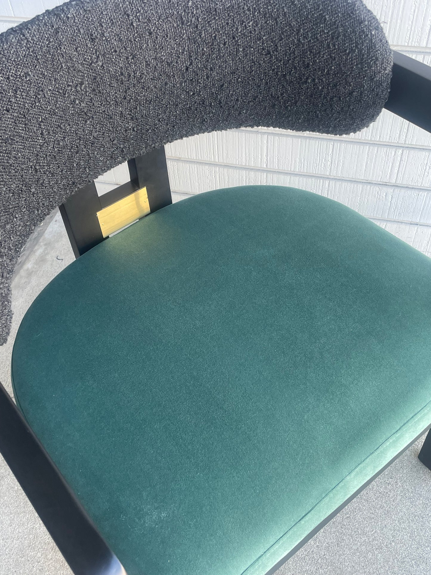 Close up of green velvet dining chair