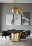 black marble top, gold oval dining table with 6 black wave dining chairs