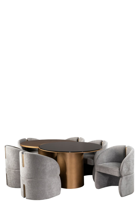 Bronze round table with gray upholstered chairs on a white background