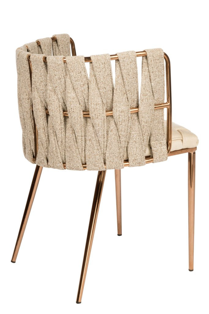 Chair with woven backrest and gold legs on a white background