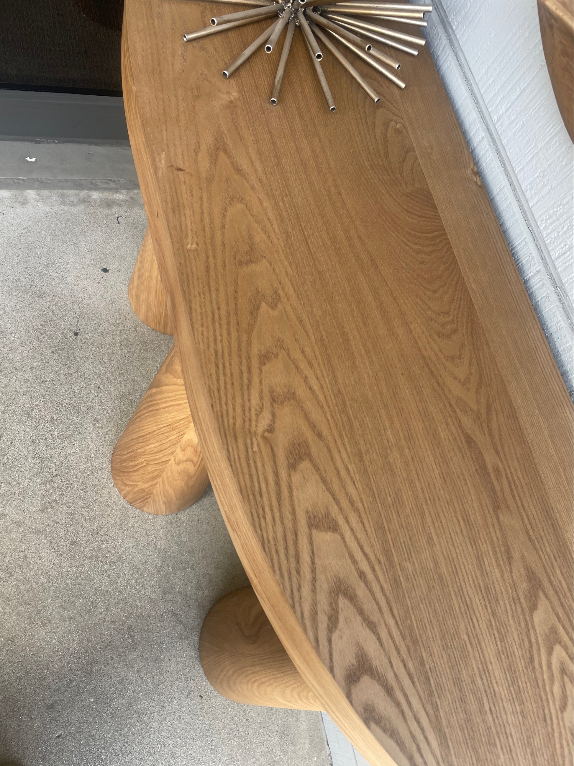 wooden half-moon console table by Statements by J