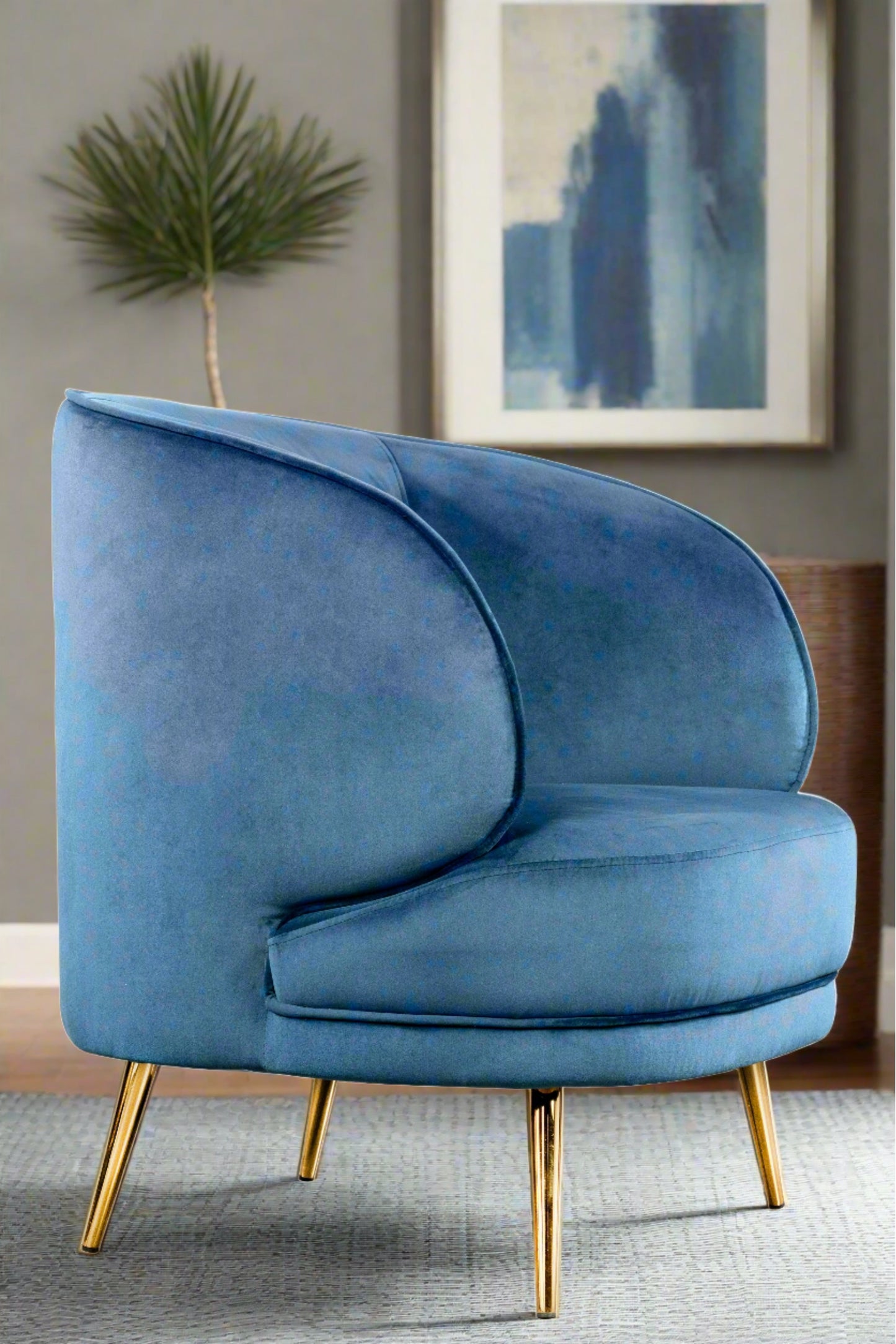 Blue velvet accent chair with gold legs