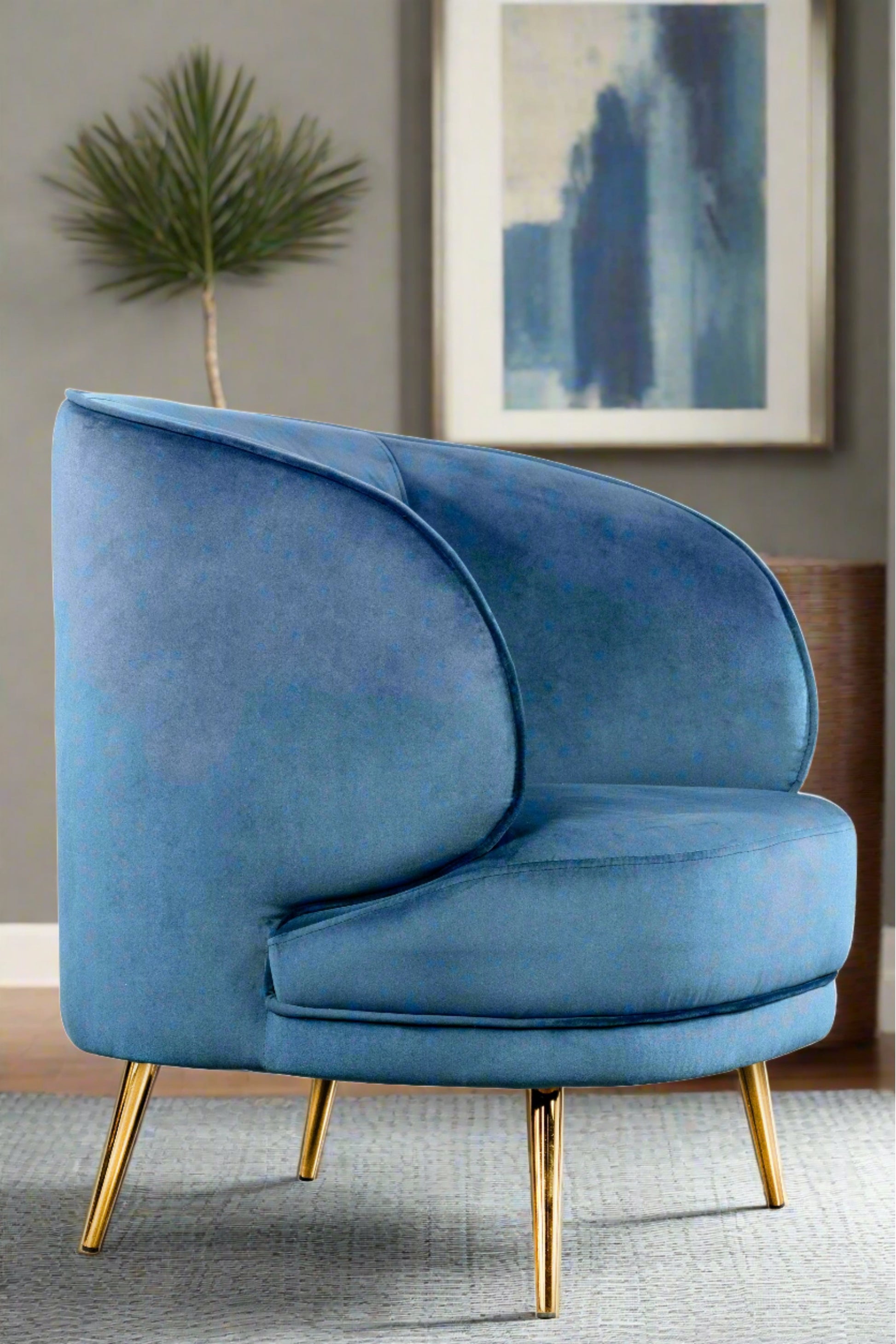 Blue velvet accent chair with gold legs