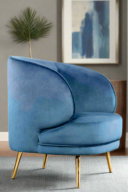 Blue velvet accent chair with gold legs